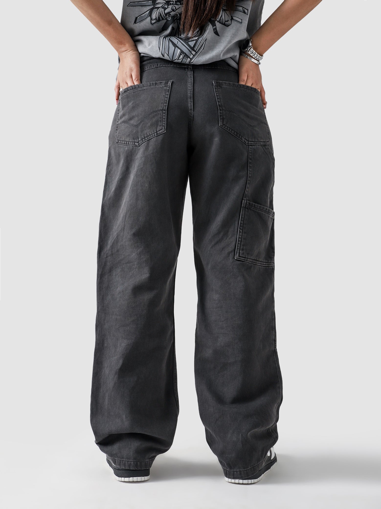 Dark grey carpenter denim couple lifestyle shot streetwear Pakistan – GROOVY