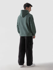 Hunter green hoodie flat lay 340 GSM oversized streetwear Pakistan – GROOVY