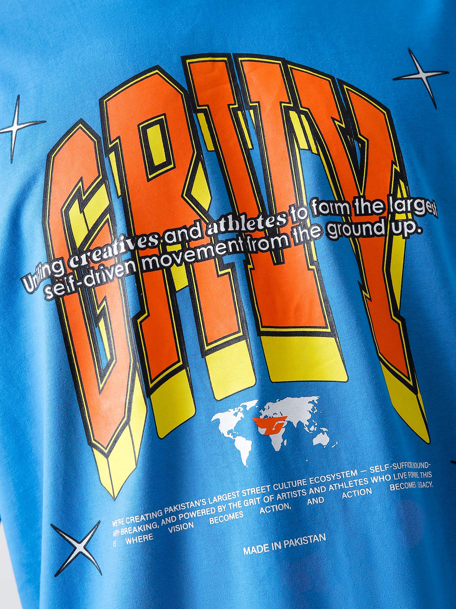 GRVY Community tee male model seated lifestyle Pakistan – GROOVY