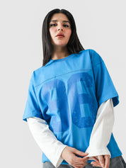 96 Double Layer Jersey electric blue male model seated lifestyle Pakistan – GROOVY