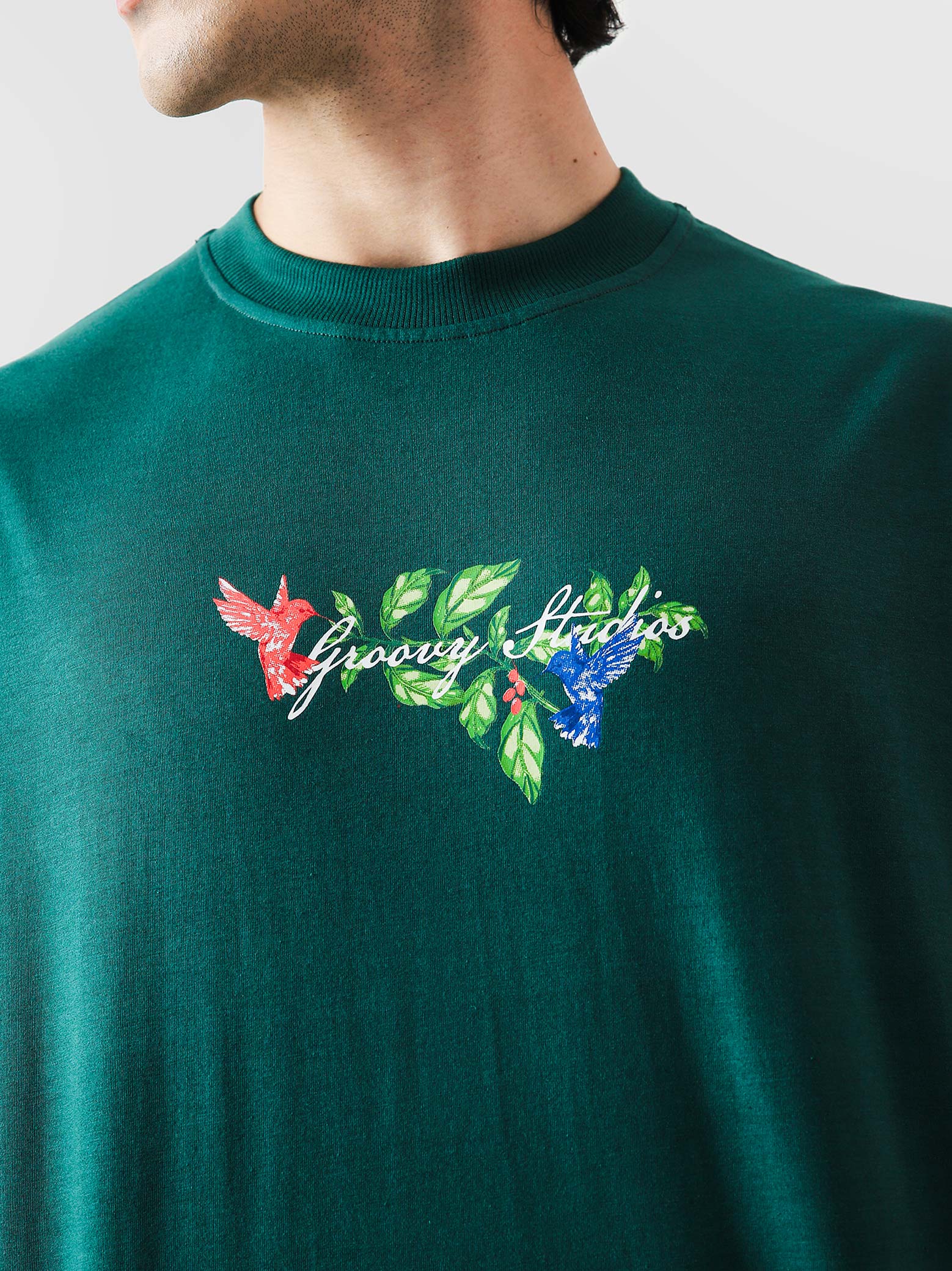 Green Hummingbird tee couple lifestyle shot Pakistan – GROOVY