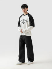 ROLLER TEE male model seated half body lifestyle shot Pakistan – GROOVY