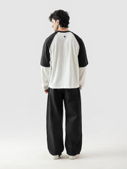 ROLLER TEE closeup contrast sleeve stitching detail built-in layer Pakistan – GROOVY