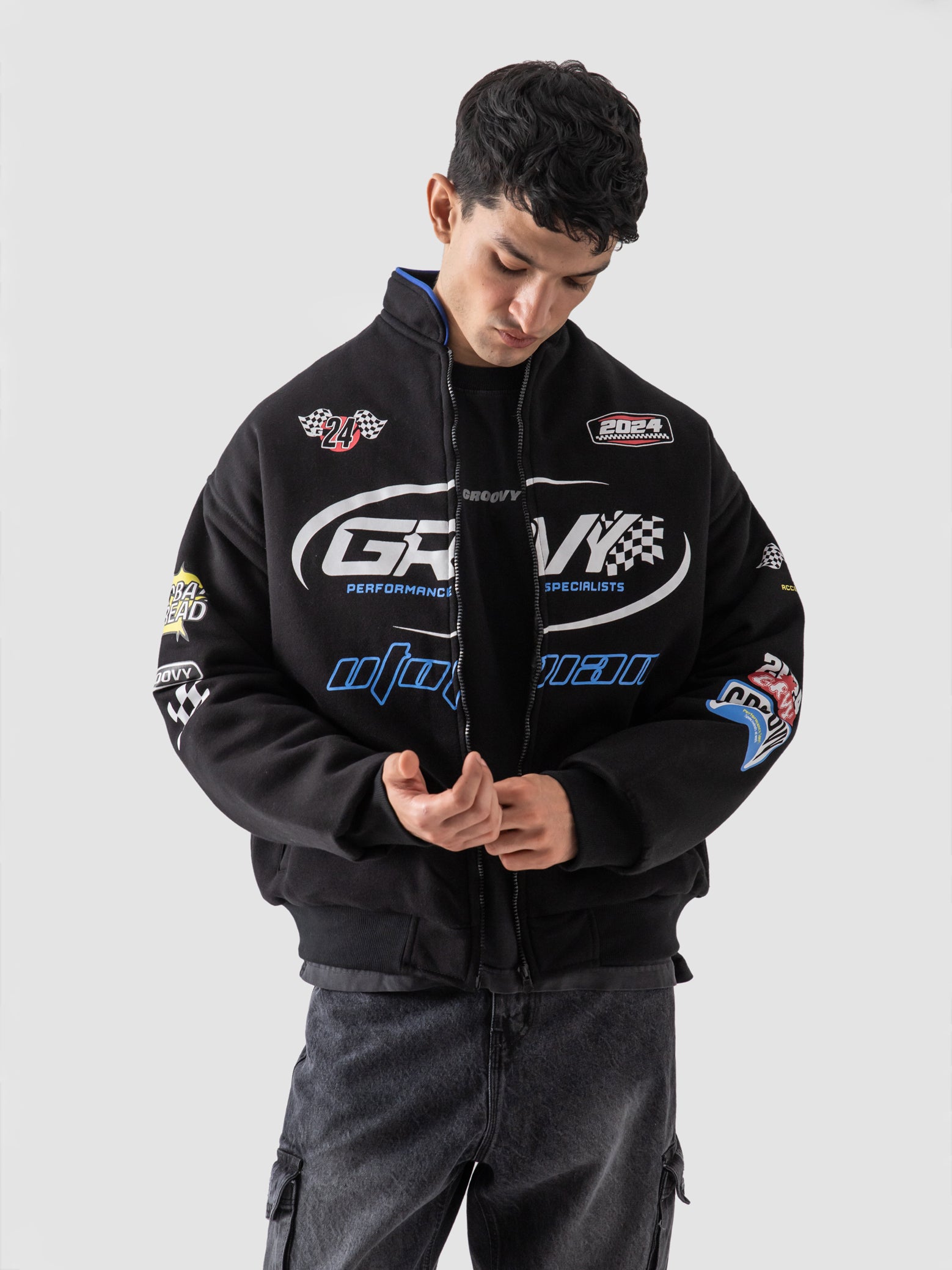 Racer jacket couple lifestyle shot black moto outerwear Pakistan – GROOVY
