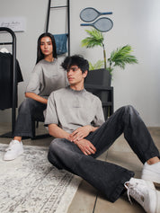 Oil fade blank t-shirt male model seated lifestyle shot Pakistan – GROOVY