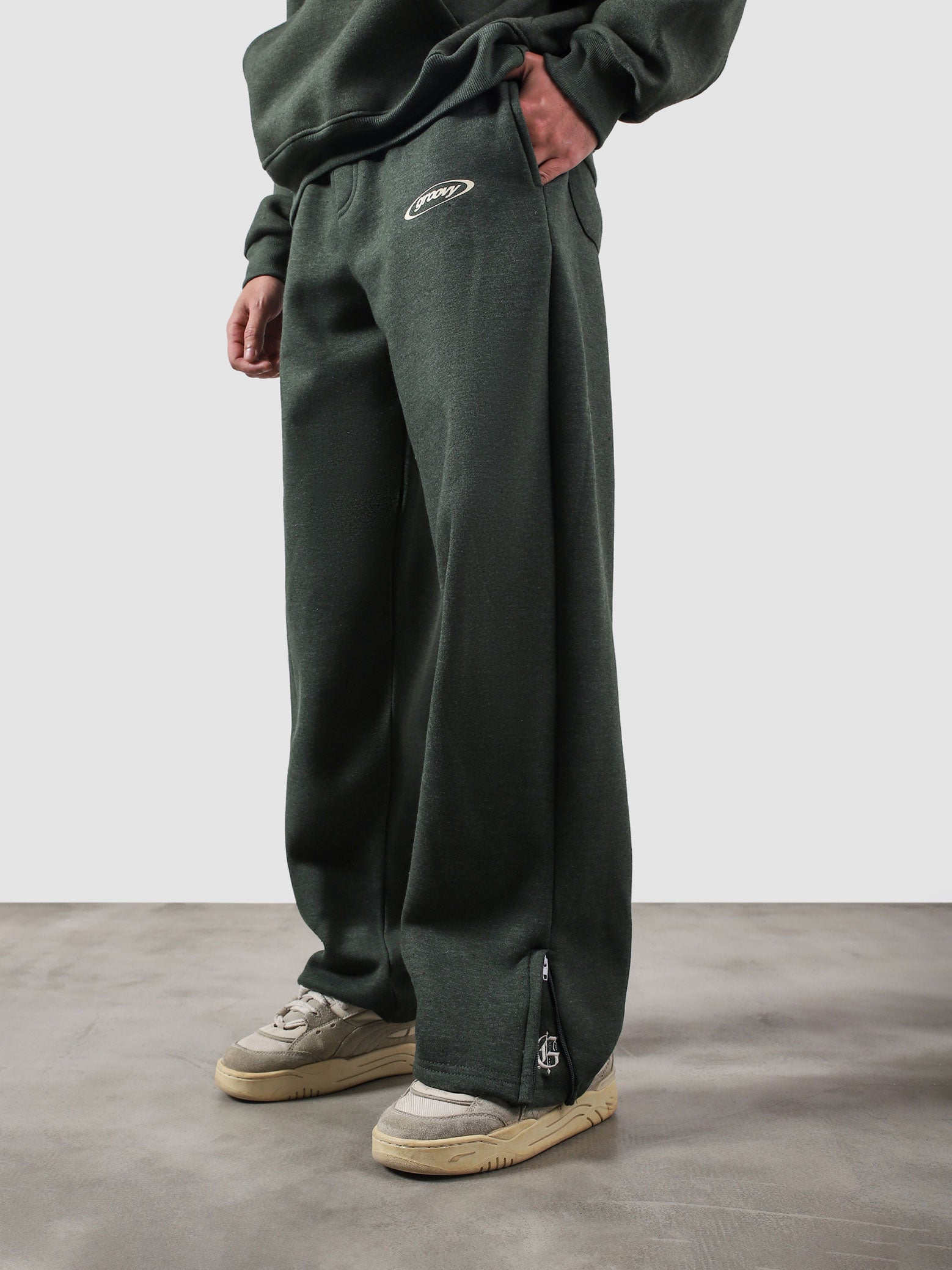 Utility Sweats heather green male model full body front view relaxed fit Pakistan – GROOVY