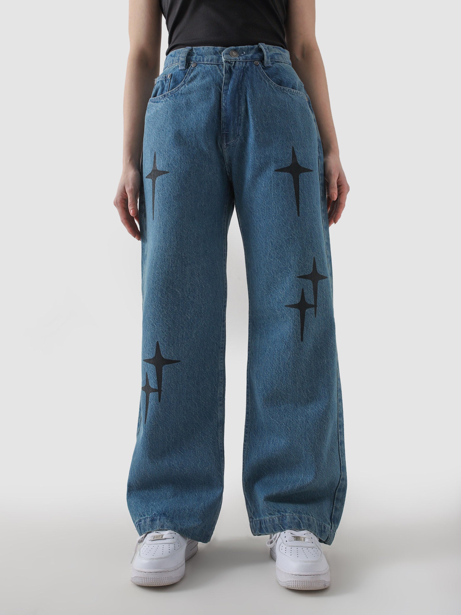 Cross star printed denim blue baggy jeans male model front view Pakistan – GROOVY