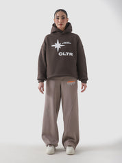 Never Stopping Culture chocolate brown hoodie male model full body front Pakistan – GROOVY