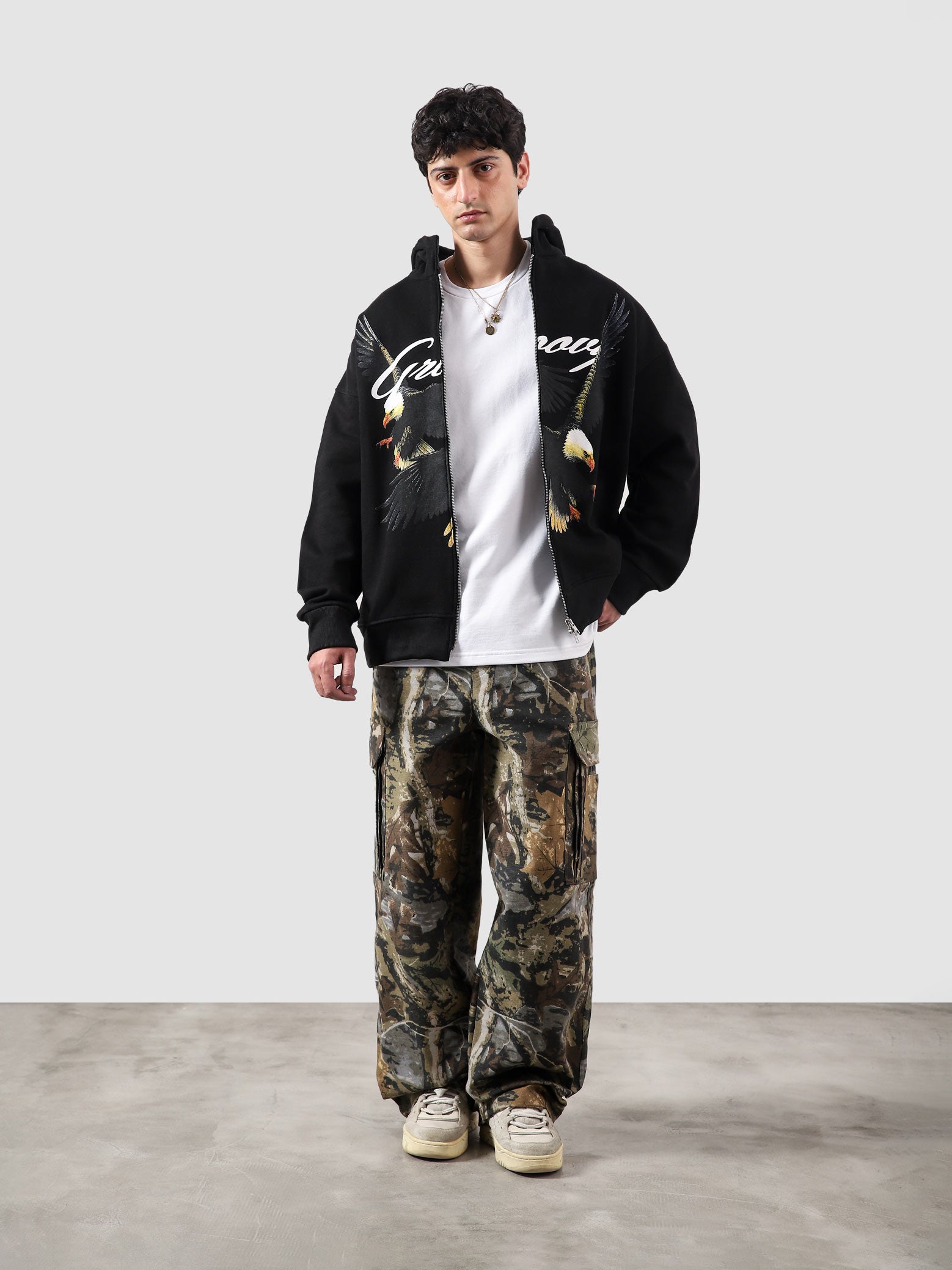 Flying Predator zipper hoodie male model full body front view bold eagle graphic Pakistan – GROOVY