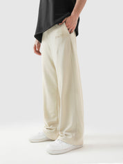 Cream baggy trousers full body front shot male model Pakistan – GROOVY