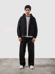 Black essential zipper hoodie male model full body front view Pakistan – GROOVY