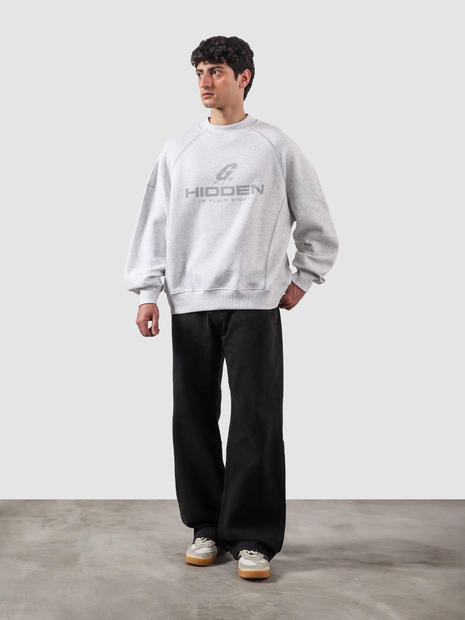 Hidden In Plain Sight arctyc white oversized sweatshirt male model full body front view Pakistan – GROOVY
