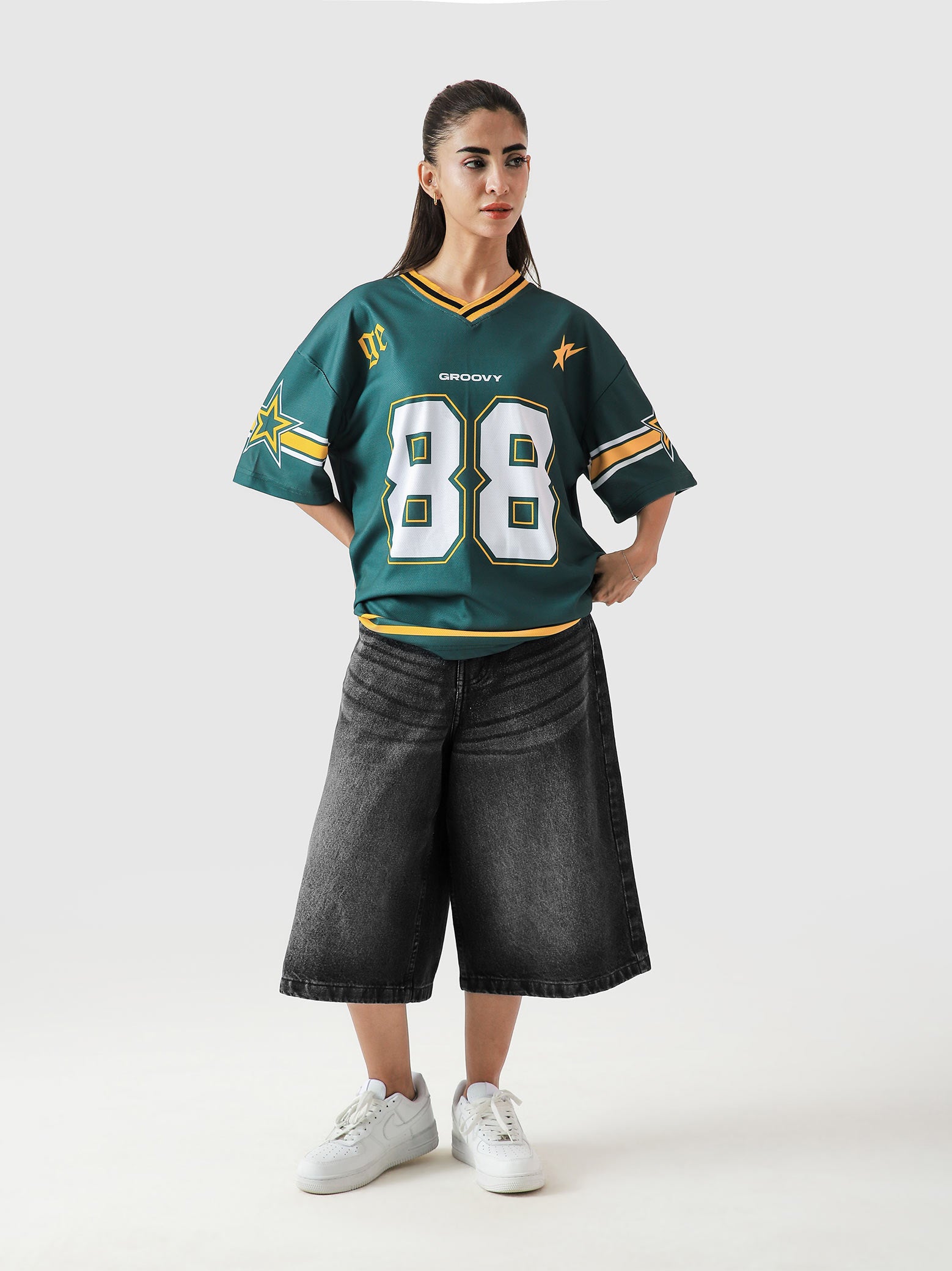 88 Athletics basketball jersey racing green gold male model full body front Pakistan – GROOVY