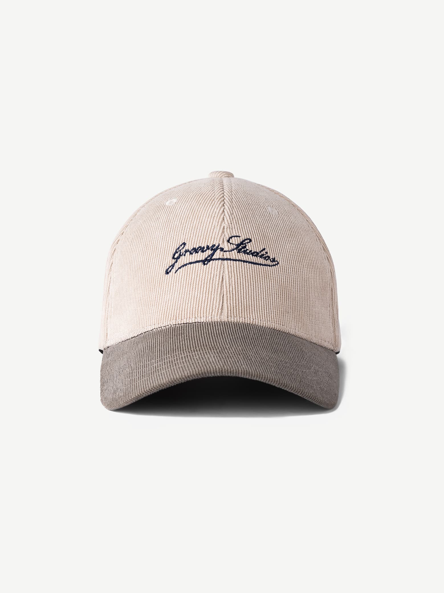GROOVY UTOPIA two-tone corduroy cap in cream with ribbed texture and script logo