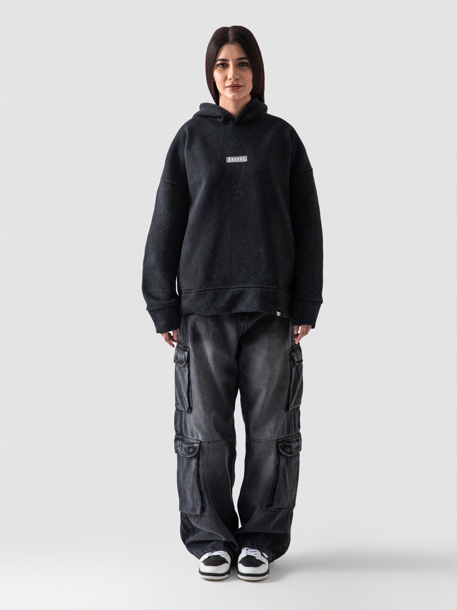 Washed black oversized hoodie male model full body front view Pakistan – GROOVY