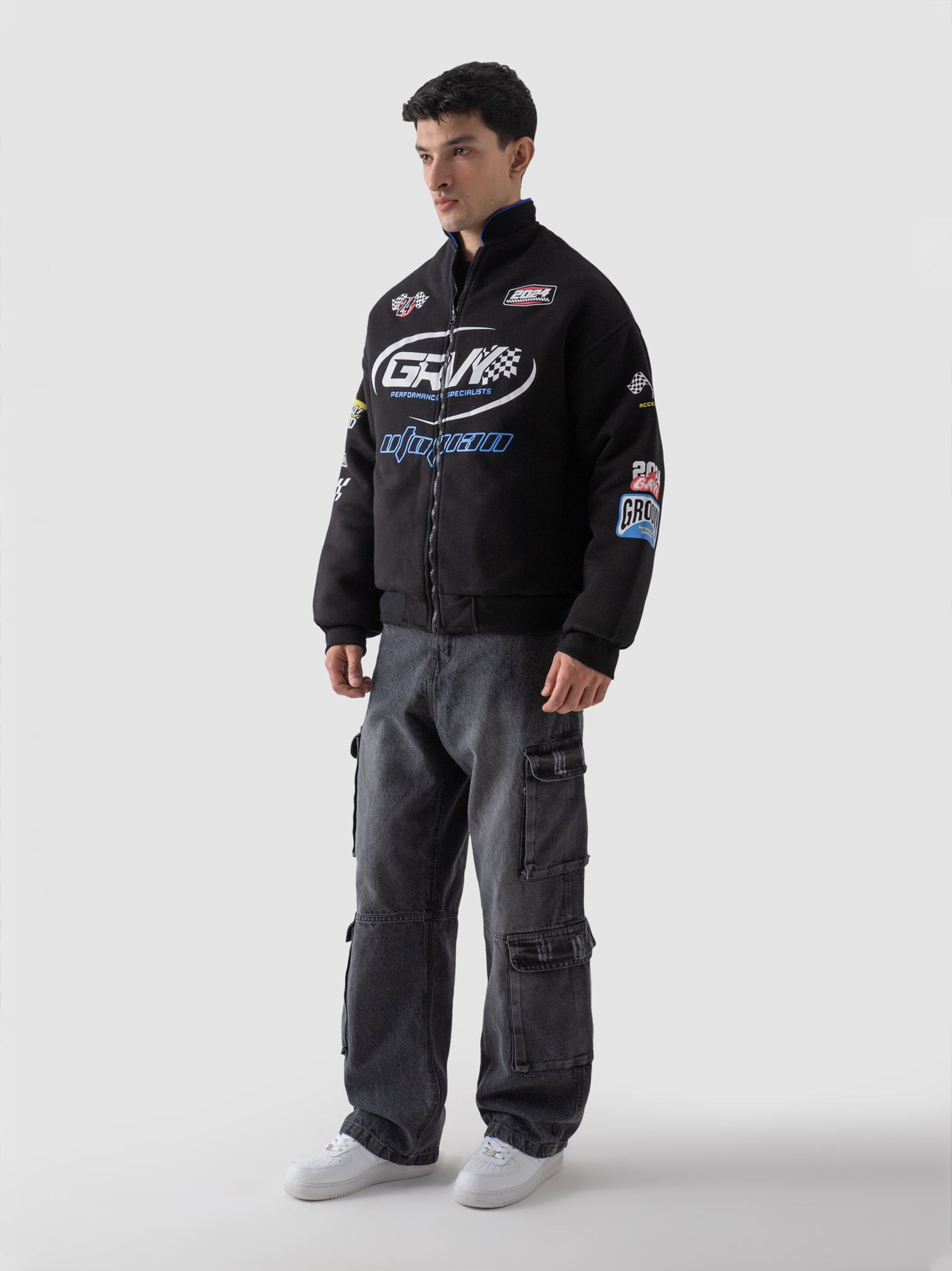 Racer jacket black male model full body front view moto outerwear Pakistan – GROOVY