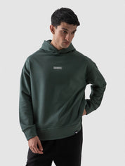 Hunter green oversized hoodie male model full body front view Pakistan – GROOVY