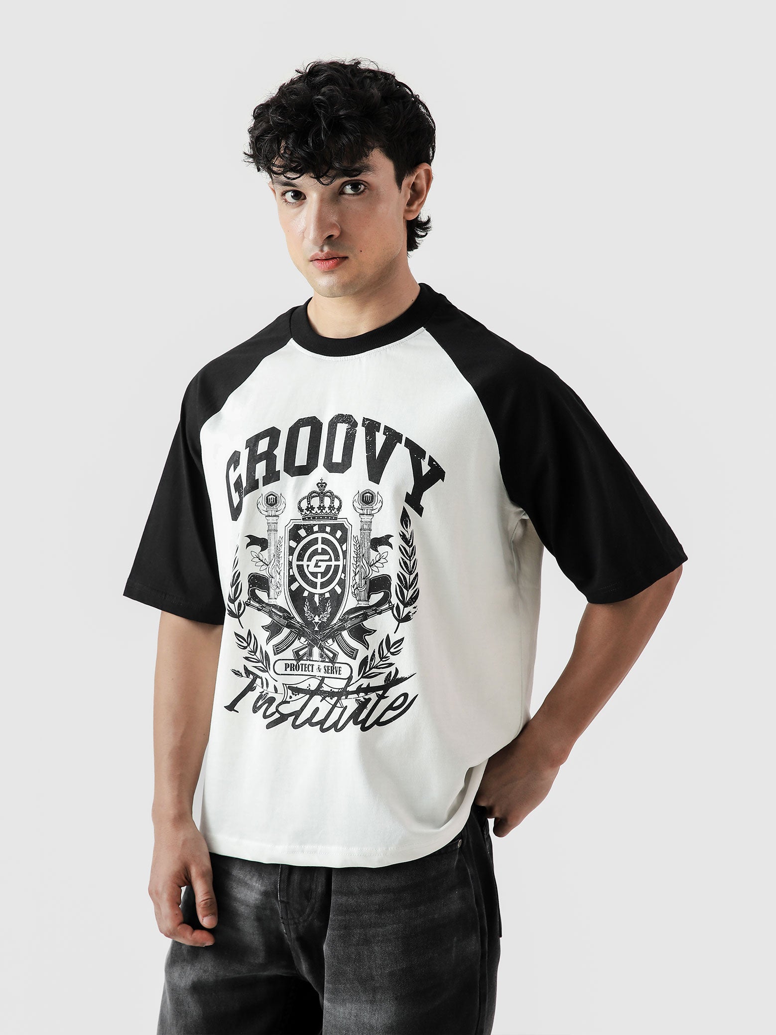 Institute of GRVY black oversized tee male model full body front view Pakistan – GROOVY