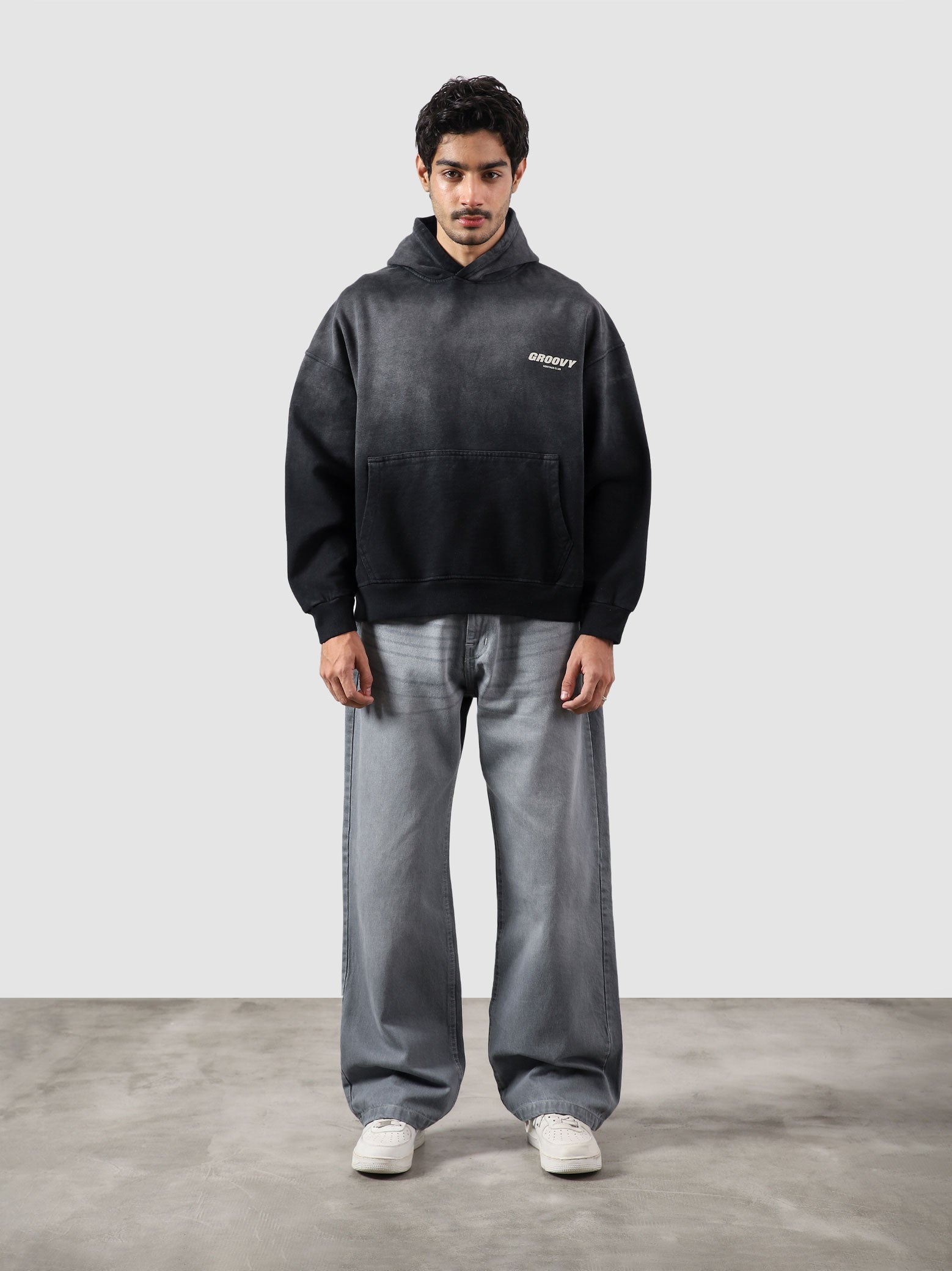 Fade washed hoodie male model full body front view vintage fade wash Pakistan – GROOVY