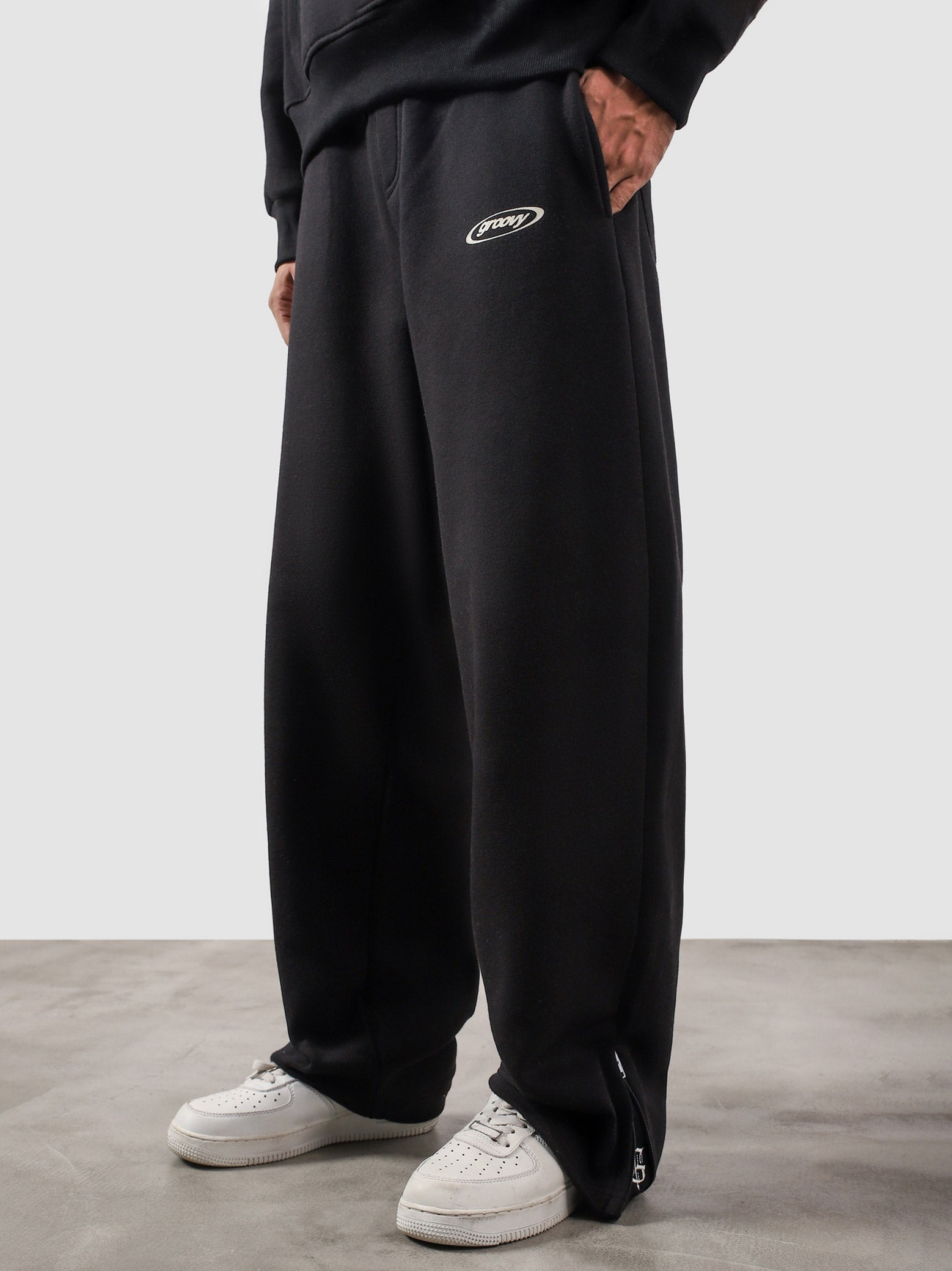 Utility Sweats black male model back view relaxed fit Pakistan – GROOVY