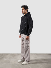 The Initial Hoodie male model back view allover initial graphic Pakistan – GROOVY