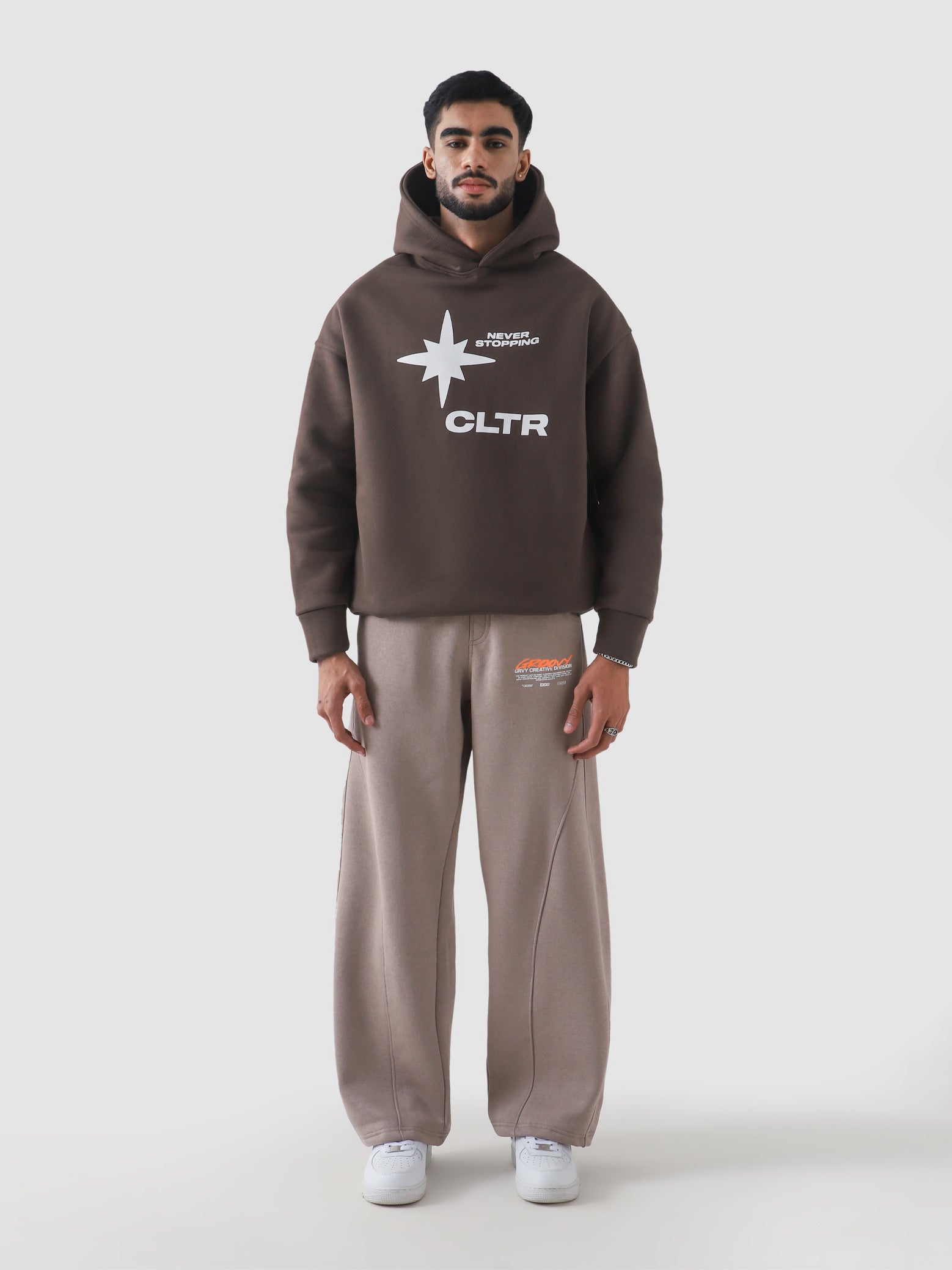 Never Stopping Culture hoodie male model back view 340 GSM fleece Pakistan – GROOVY