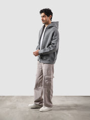 Dark heather grey essential zipper hoodie male model back view relaxed fit Pakistan – GROOVY