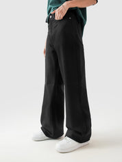 CORE denim black jeans male model back view relaxed fit Pakistan – GROOVY