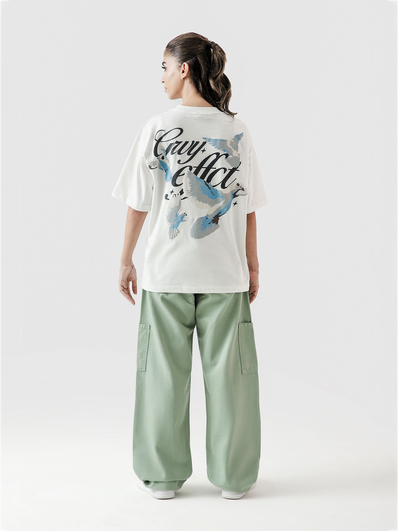 GRVYBirds puff printed tee male model side angle Pakistan – GROOVY