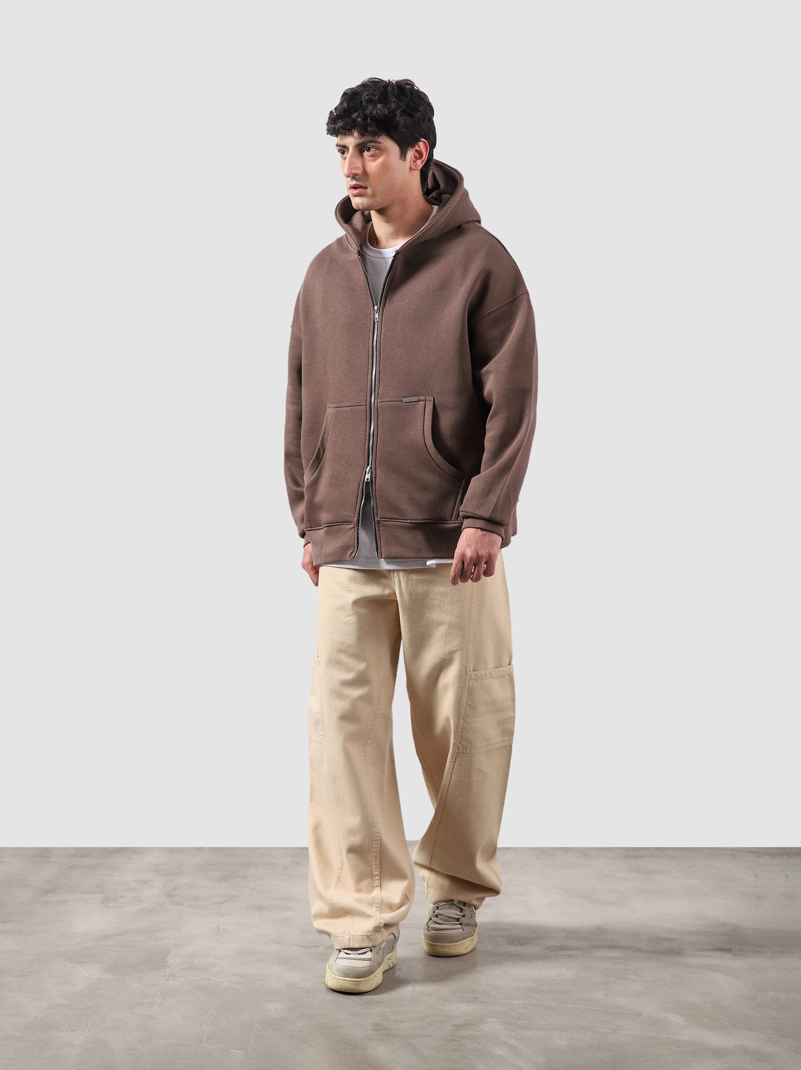 Maple brown essential zipper hoodie male model back view relaxed fit Pakistan – GROOVY
