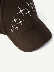 Brown cap with white geometric patterns on a white background