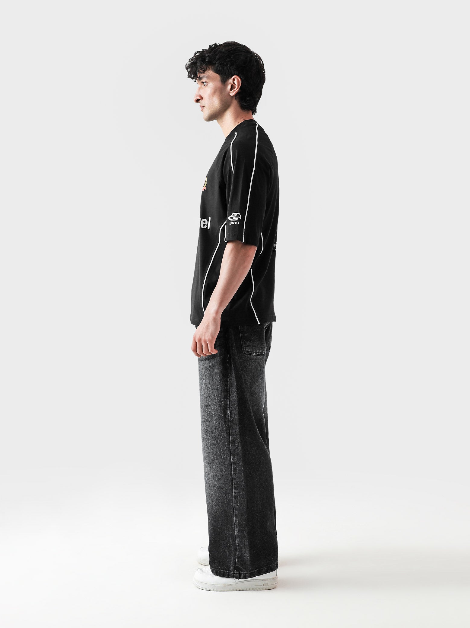 HARSH and CRUEL #7 black jersey male model back view graphic piping Pakistan – GROOVY