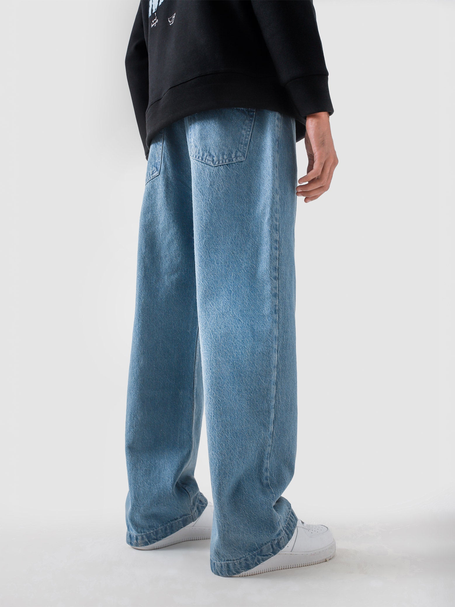 CORE denim washed blue baggy jeans male model back view relaxed fit Pakistan – GROOVY