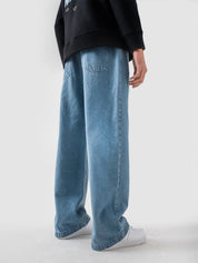 CORE denim washed blue baggy jeans male model back view relaxed fit Pakistan – GROOVY