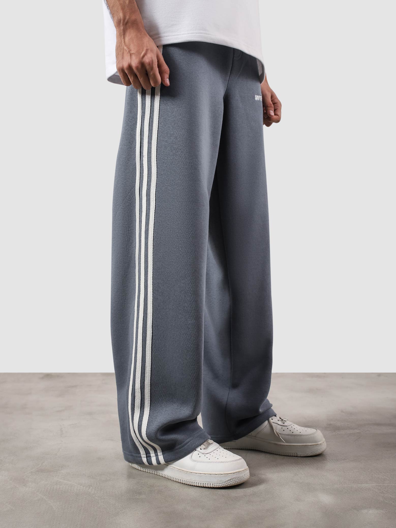 Heritage Pants frost blue male model back view striped sides relaxed fit Pakistan – GROOVY