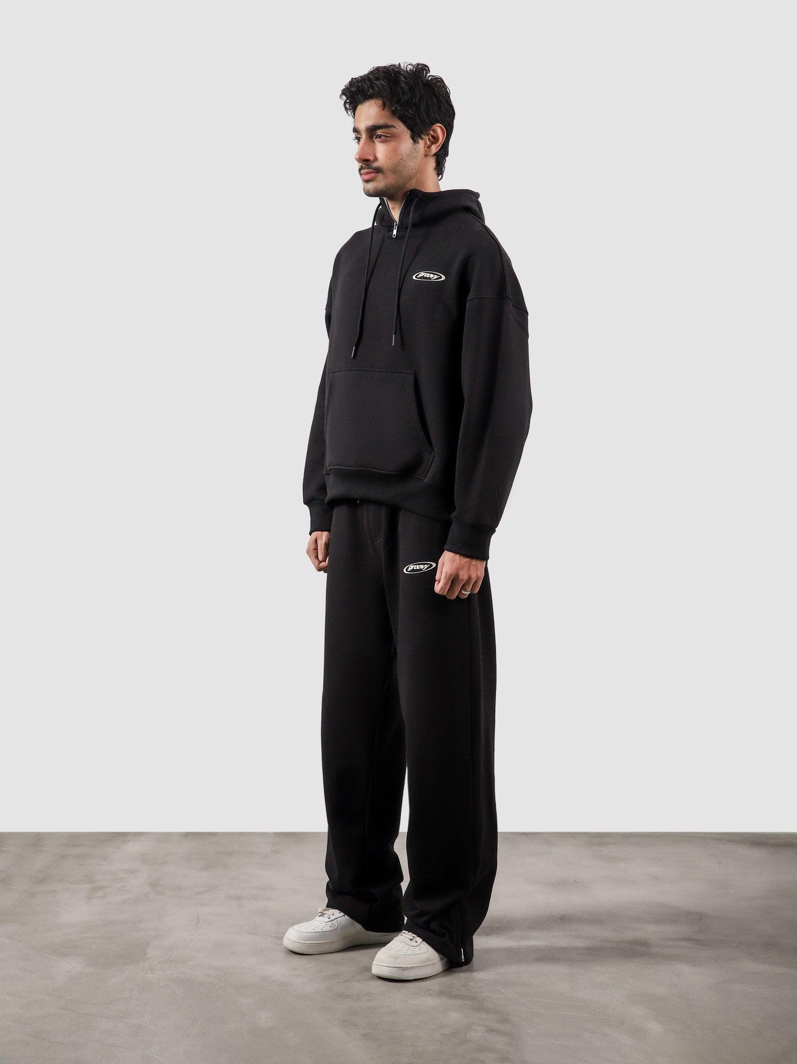 Utility Top black male model back view oversized relaxed fit Pakistan – GROOVY