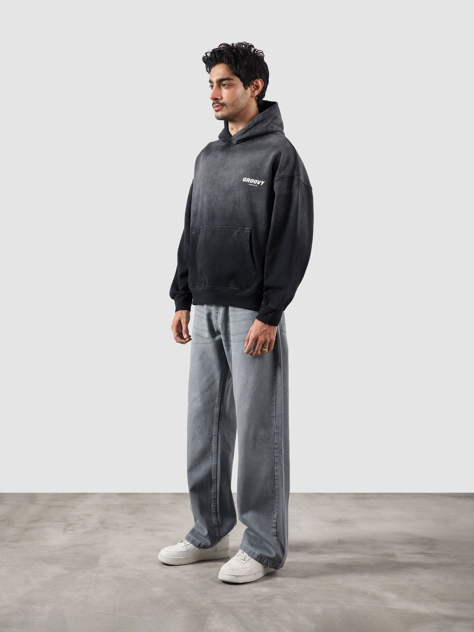 Fade washed hoodie male model back view 320 GSM fleece fade wash Pakistan – GROOVY