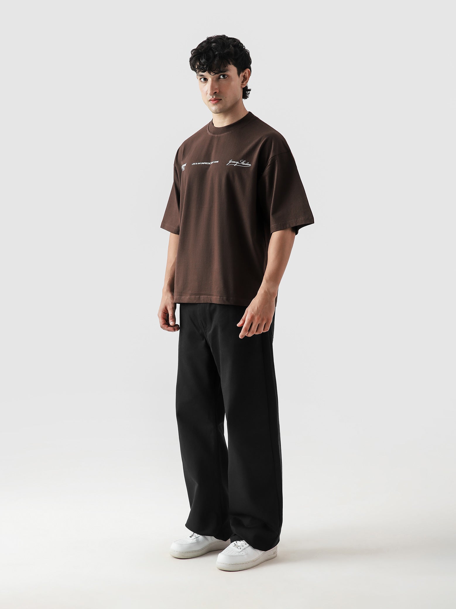 DICES GRVY tee male model back view dice graphic print mocha brown Pakistan – GROOVY