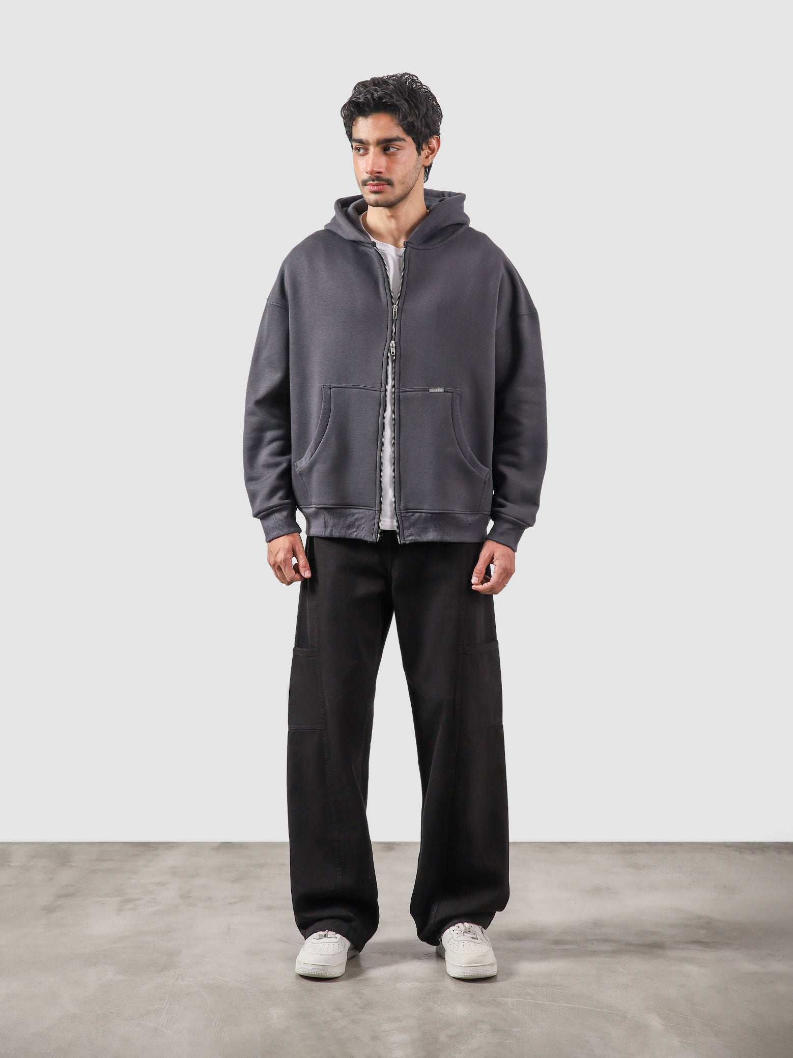 Granite essential zipper hoodie male model back view relaxed fit Pakistan – GROOVY