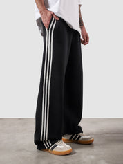 Heritage Pants black summer male model back view striped sides relaxed fit Pakistan – GROOVY