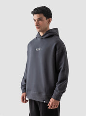 Dark grey oversized hoodie couple lifestyle shot streetwear Pakistan – GROOVY
