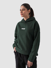 Dark green hoodie male model back view oversized relaxed fit Pakistan – GROOVY