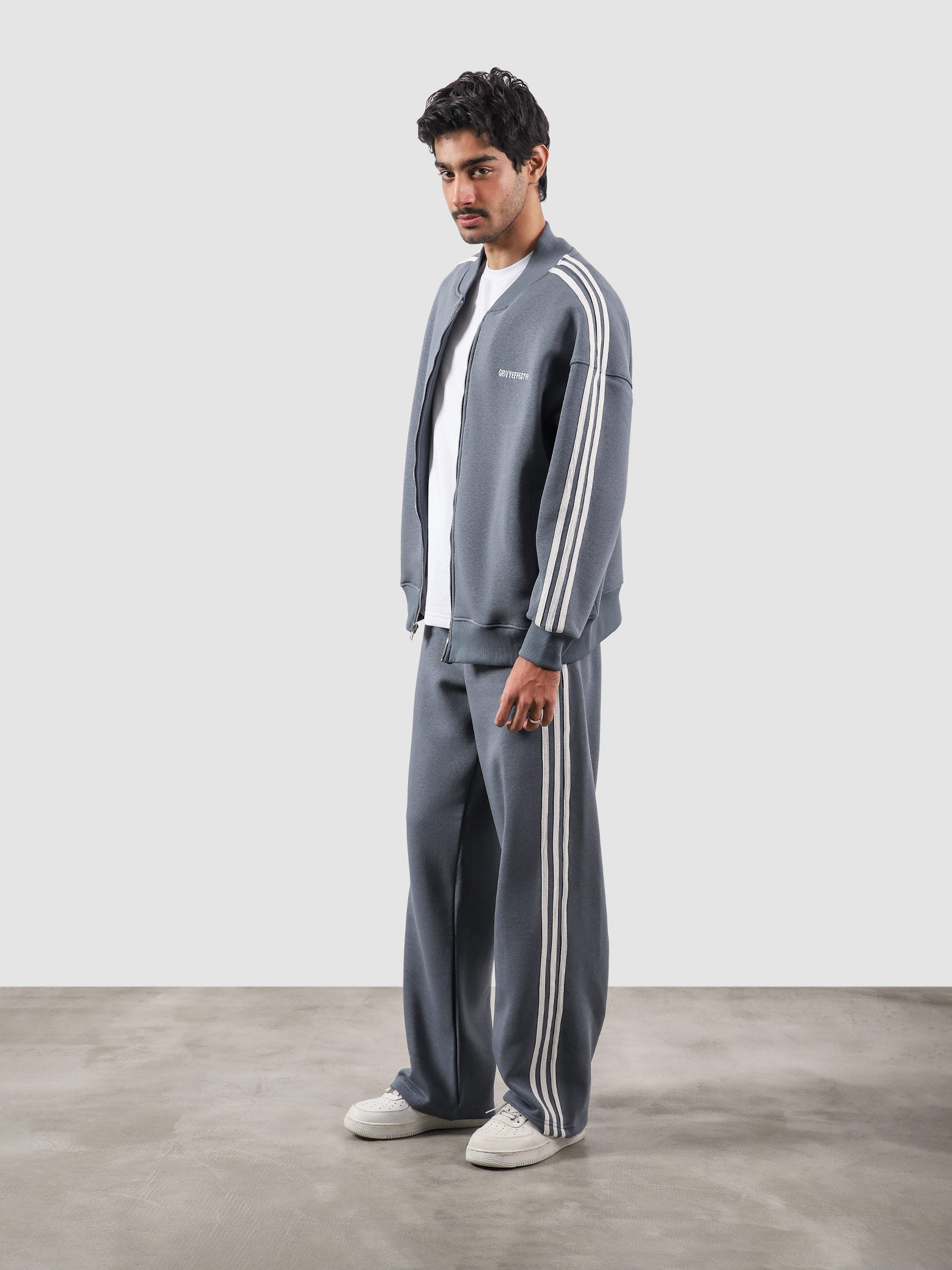 Heritage Top frost blue male model back view contrast stripe track jacket Pakistan – GROOVY