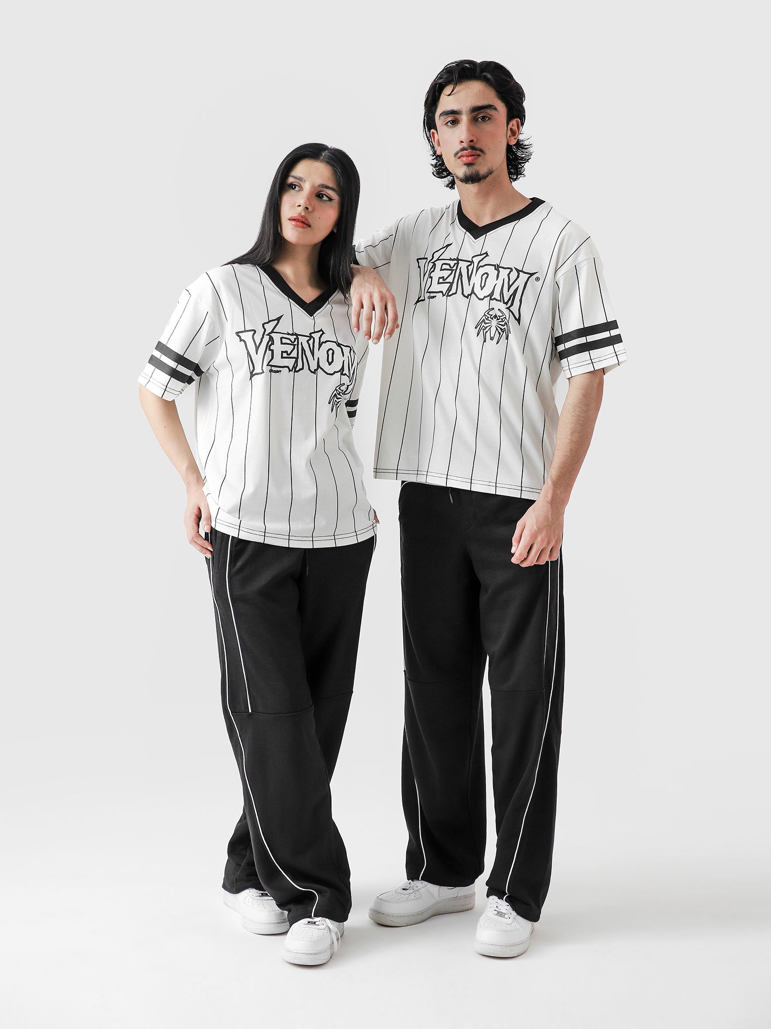 VENOM jersey white male model back view bold venom graphic pinstripe Pakistan – GROOVY