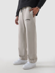 Chalk essential trouser male model back view 300 GSM cotton streetwear Pakistan – GROOVY
