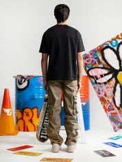Black Oversized Tee Male Model Back View – Dropout – GROOVY Pakistan