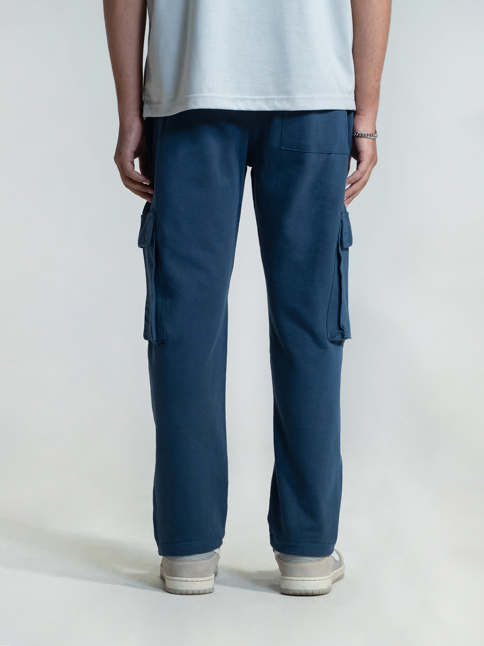 Deep Blue Cargo Trousers Male Model Side View – GROOVY Pakistan