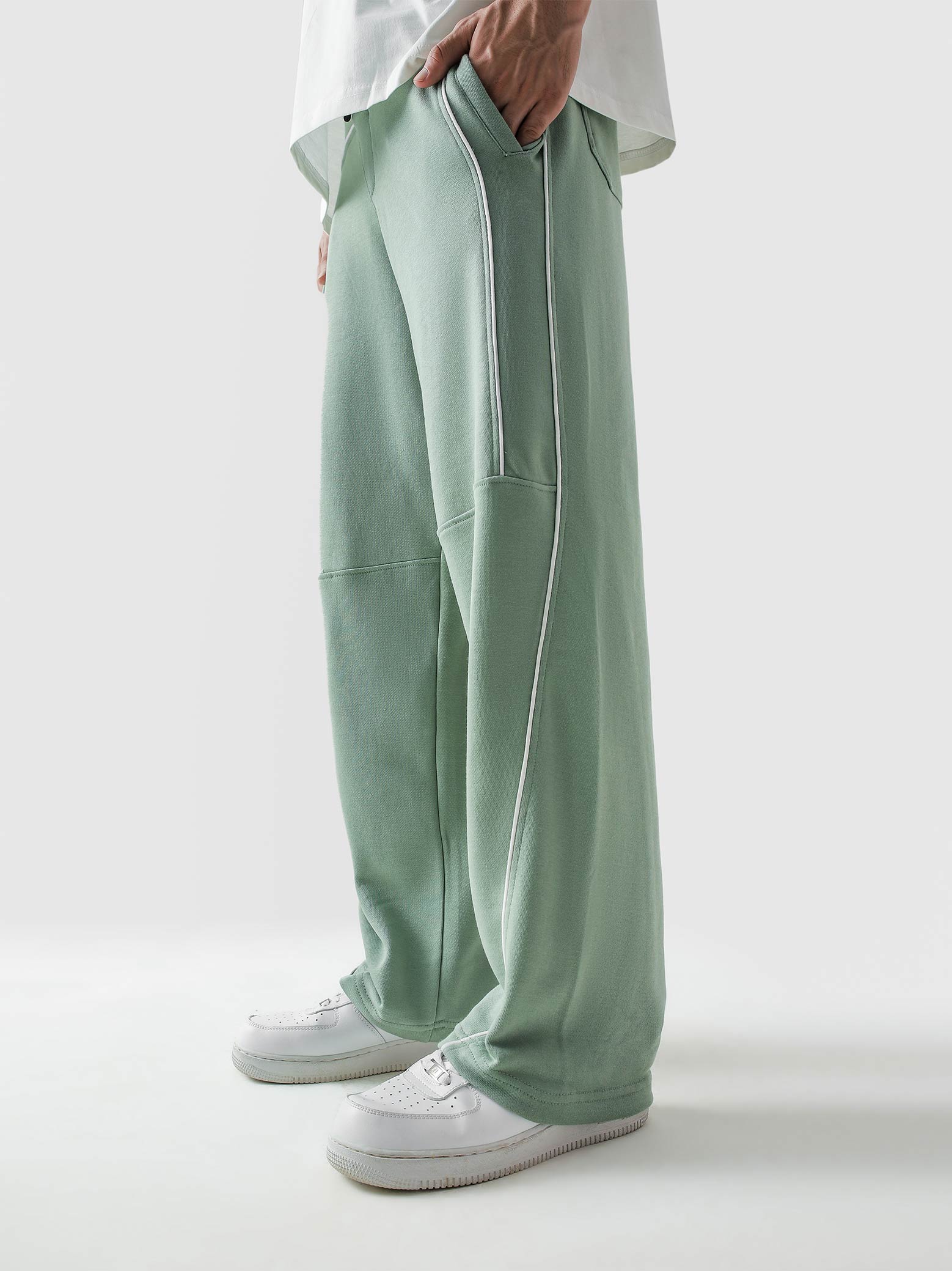 Piping trouser sage green male model side view full body streetwear Pakistan – GROOVY