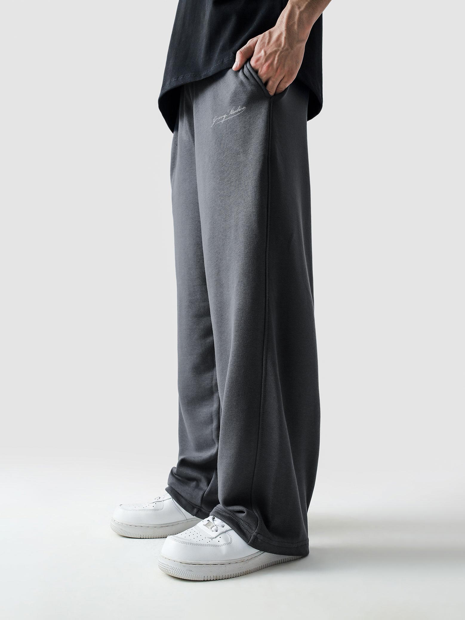 Steel grey baggy trousers male model side view full body streetwear Pakistan – GROOVY