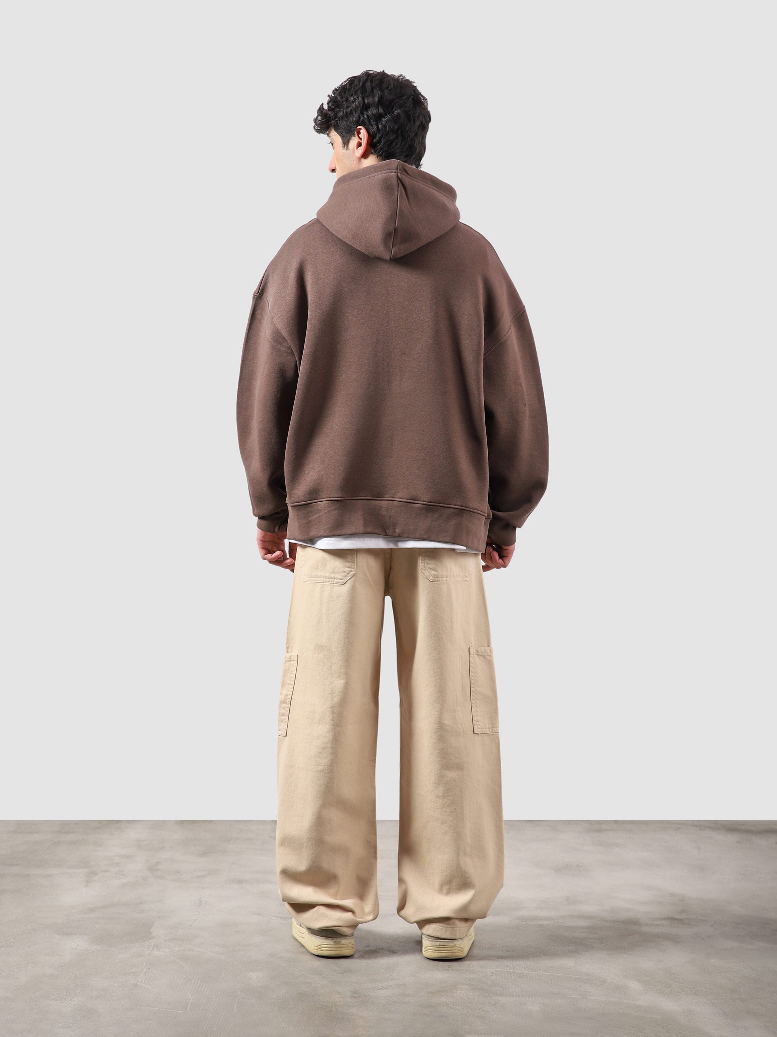 Maple brown essential zipper hoodie male model side view full body Pakistan – GROOVY